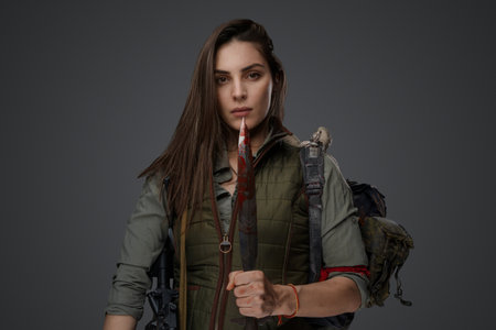 Middle Eastern Survivalist Woman with Rifleの写真素材