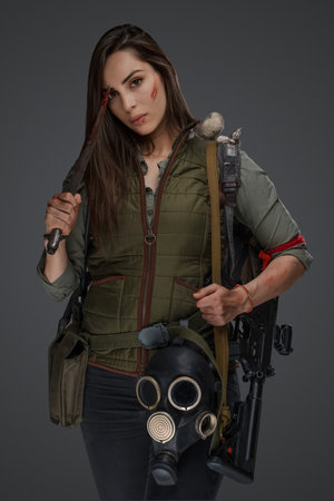 Middle eastern female survivor, dagger poseの写真素材
