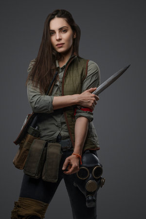 Middle eastern female survivor, dagger poseの写真素材