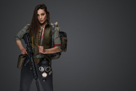 Middle Eastern Survivalist Woman with Rifleの写真素材