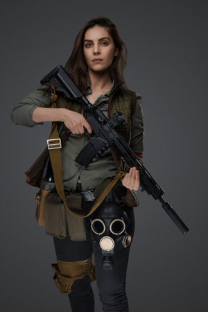 Middle Eastern Survivalist Woman with Rifleの写真素材