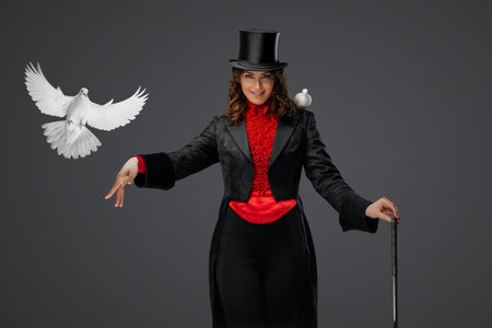 Graceful magician with white dovesの写真素材
