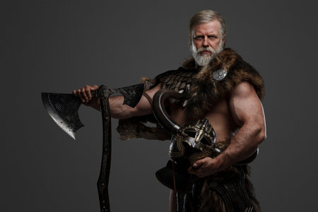 Grizzled elderly Viking warrior, displaying strength and wisdomの写真素材