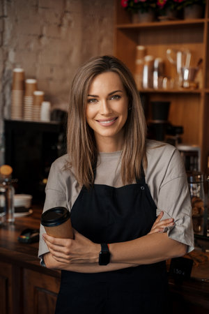 Entrepreneurial Barista with Takeaway Coffeeの写真素材