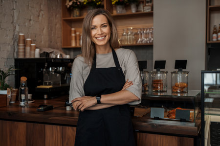 Confident Female Barista in Coffee Shopの写真素材