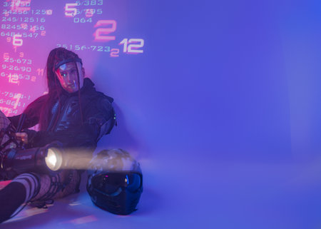 Woman in Tactical Black Suit with Open Space for Text, Featuring Projectorの写真素材