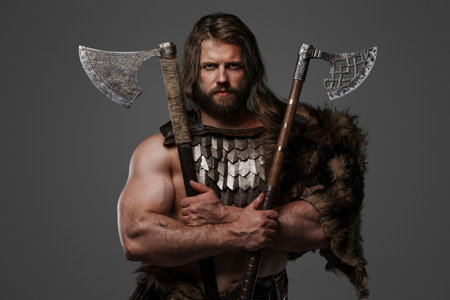 A fierce bearded Viking warrior in fur and light armorの写真素材