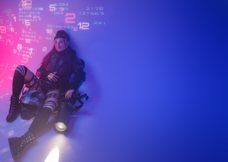 Digital Futurism: Woman in Tactical Black Suit with Open Space for Textの写真素材