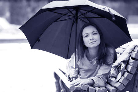 monochrome fall portrait of a beautiful womanの写真素材