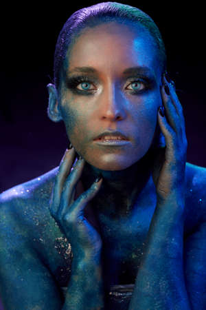 Fashion portrait with art make up and face artの写真素材