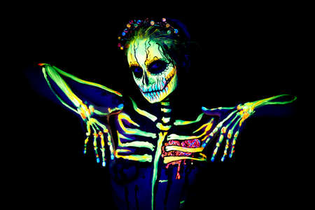 UV body art painting of helloween female skeletonの写真素材