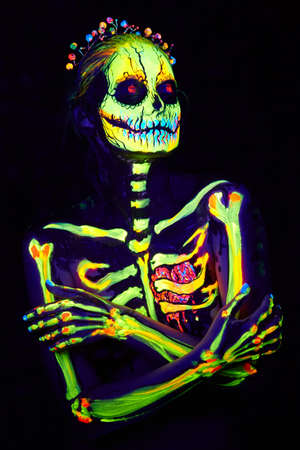 UV body art painting of helloween female skeletonの写真素材