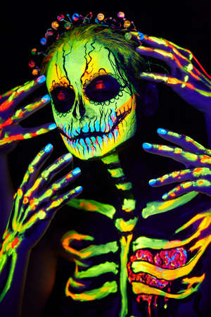 UV body art painting of helloween female skeletonの写真素材