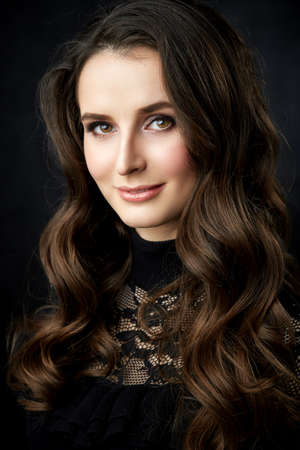portrait of a lovely young woman in a studioの写真素材