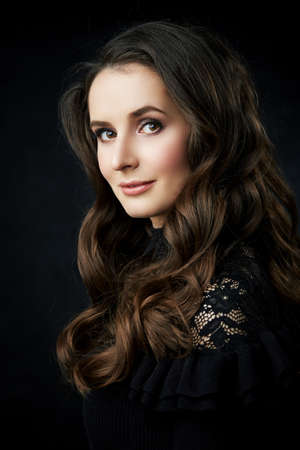 portrait of a lovely young woman in a studioの写真素材