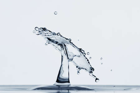 water splash isolated on white backgroundの写真素材