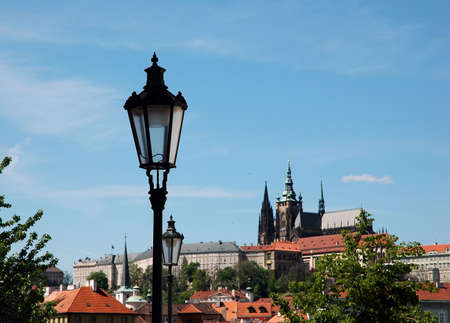 Prague castle and a detail of ancient lanternの写真素材