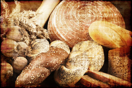 Old-fashioned grungy background with various bakery goodsの写真素材
