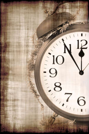 Grunge christmas background with old alarm clock and ribbonの写真素材