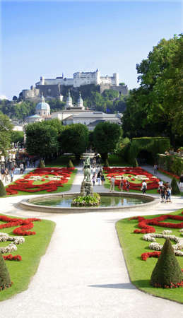 View at Austrian citySalzburg castle from the gardens の写真素材