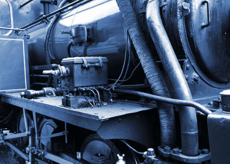Old locomotive in a cold blue tint