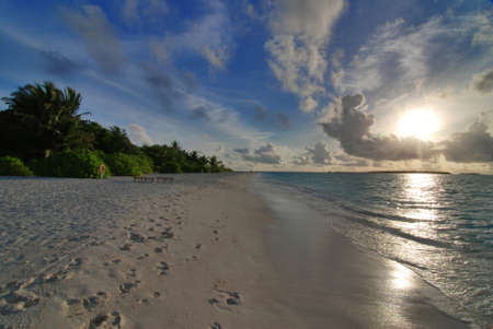 Beautiful colorful sunset over the ocean in the Maldives seen from the beach - HDRの写真素材