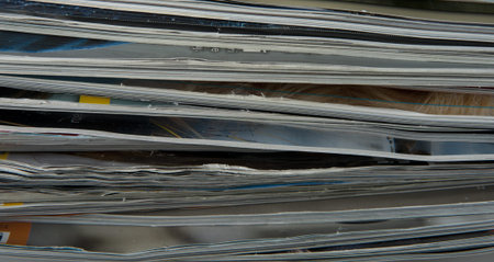 Stack of magazines isolated on a white backgroundの写真素材