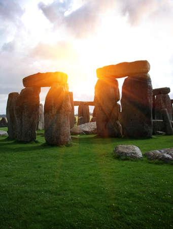 Fantasy sunrise at Stonehenge with dramatic sky and sun raysの写真素材