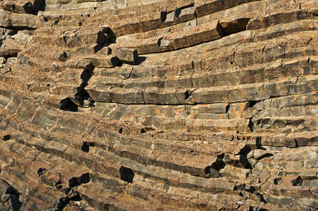 Natural background of hexagonal basalt columns in Icelandic national park Jokulsargljufur