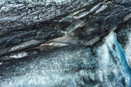 Detailed of the Icelandic dirty glacier ice with a incredibly vivid colors and a nice textureの写真素材