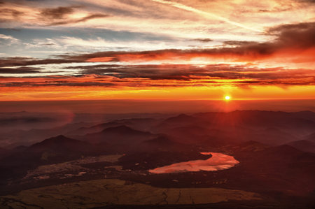 Beautiful vivid sunrise seen from the mount Fuji at the lake Kawaguchi, Japan