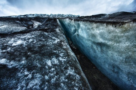 Detailed photo of the Icelandic glacier ice with a incredibly vivid colors and a nice texture