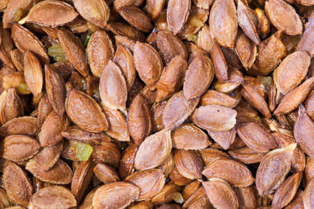 Background made of fresh plum stonesの写真素材