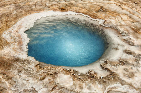 Incredibly blue small pool at Hveravellir is actually a hot geothermal spring in the heart of Iceland. の写真素材