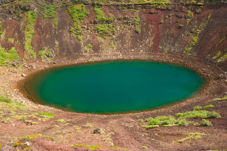 Kerid is a beautiful crater lake of a turquoise color located on the South-West of Iceland. HDR