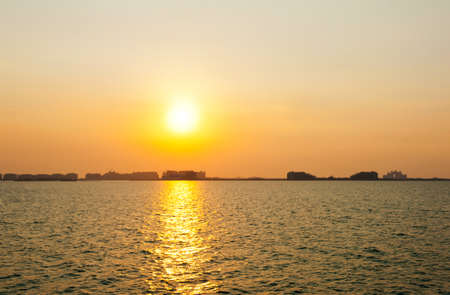 Sunset over sea in Dubai seen from Jumeirah beachの写真素材