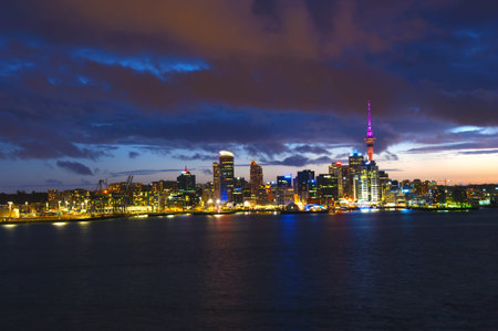 Skyline photo of the biggest city in the New Zealand, Auckland. The photo was taken after sunset across the bayの写真素材