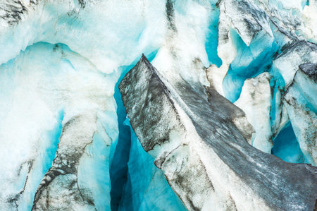 Detailed photo of the Icelandic glacier ice with a incredibly vivid colors and a nice texture