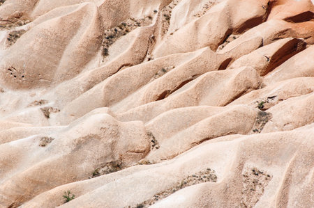 Detailed photo of vivid pink rock formations from above in Cappadocia, Turkeyの写真素材