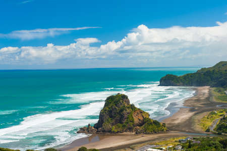 Beautiful Piha beach near Auckland with a mighty Lion Rock, New Zealandの写真素材
