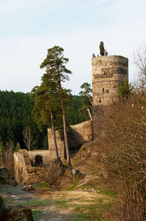 Beautiful medieval Czech castle Gutstejn located on the rock above the river in the Western Bohemiaの写真素材