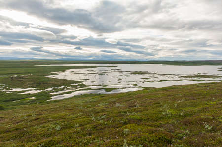 View at lakes from the Vindbelgur volcano near the lake Myvatn - northern Icelandの写真素材