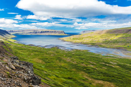 Mighty fjords rise from the sea in the Westfjords Peninsula, northwestern Iceland.の写真素材