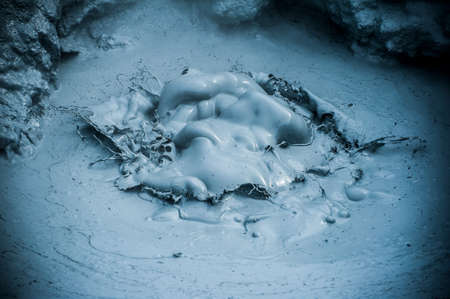 Hot boiling mud at fumarole is bubbling and exploding at mudpots, Hverir - Icelandの写真素材