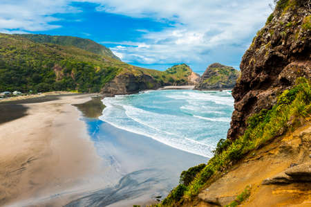 Beautiful Piha beach near Auckland seen from the mighty Lion Rock, New Zealandの写真素材