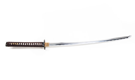 Real sharp traditional Japanese sword on a white backgroundの写真素材