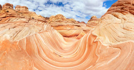 The Wave is an awesome vivid swirling petrified dune sandstone formation in Coyote Buttes North.の写真素材