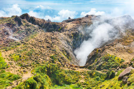 Steam rising from the crater La Soufriere volcano the highest mountain in Guadeloupe, French department in Caribbeanの写真素材