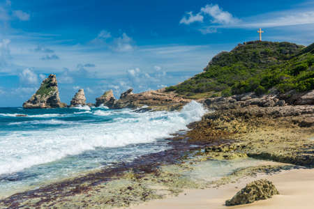 Rocks and hills  of Pointe des Chateaux, the most Eastern point of French island  of Guadeloupein the Caribbeanの写真素材