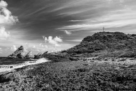 Rocks and hills  of Pointe des Chateaux, the most Eastern point of French island  of Guadeloupein the Caribbeanの写真素材